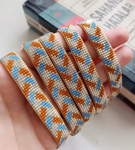 دستبند ۷ ردیفه میوکیبا طیف رنگی (آبی ، نارنجی )