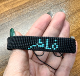 دستبند میوکی مشکی با نوشته با نام فاطر