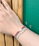 دستبند مروارید ترکیب با گوی البرناردو و بافت مکرومه طل